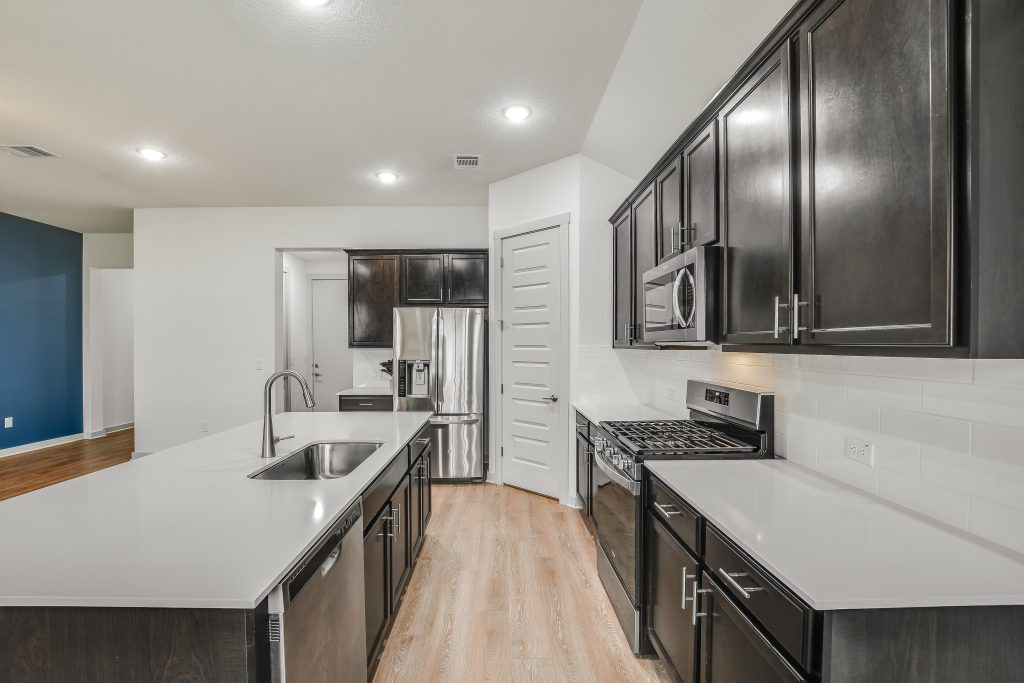 Chefs kitchen with plenty of counter and cabinet space. Gas range. Everything is like-new here. Sellers took excellent care of this home.