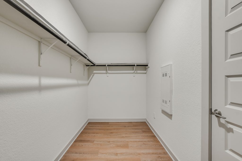 Huge walk-in closet in main bedroom. LVP floors in bedroom, bathroom and closet.