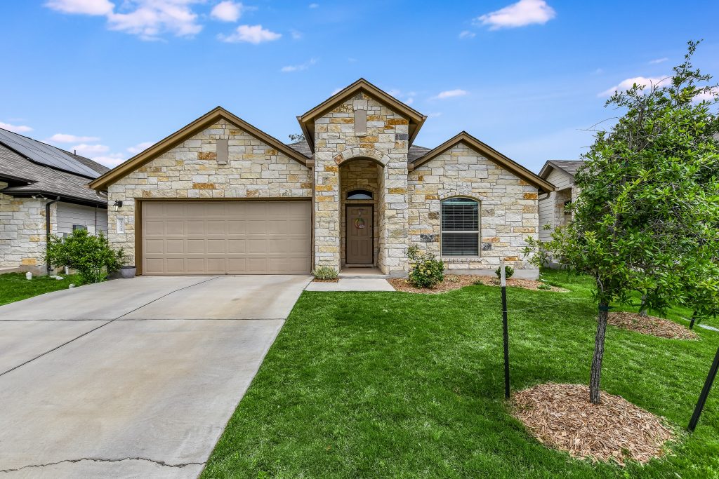 Texas limestone grand entryway. Built in 2020, like new!
